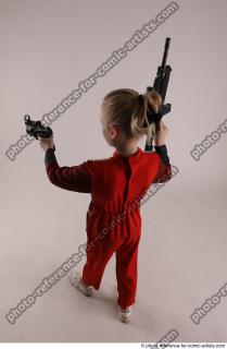 DENISA WITH TWO GUNS